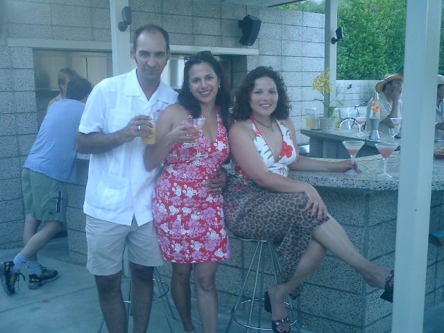 Monica at the Orbit-Ins poolside bar, sipping Orbitinis with Michael and Denise of the Conga Lounge, 5/8/04
